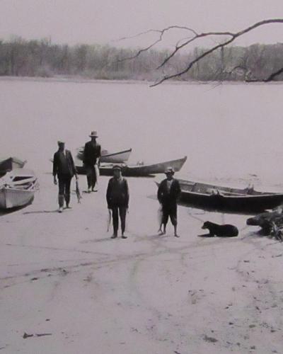 Men by the river